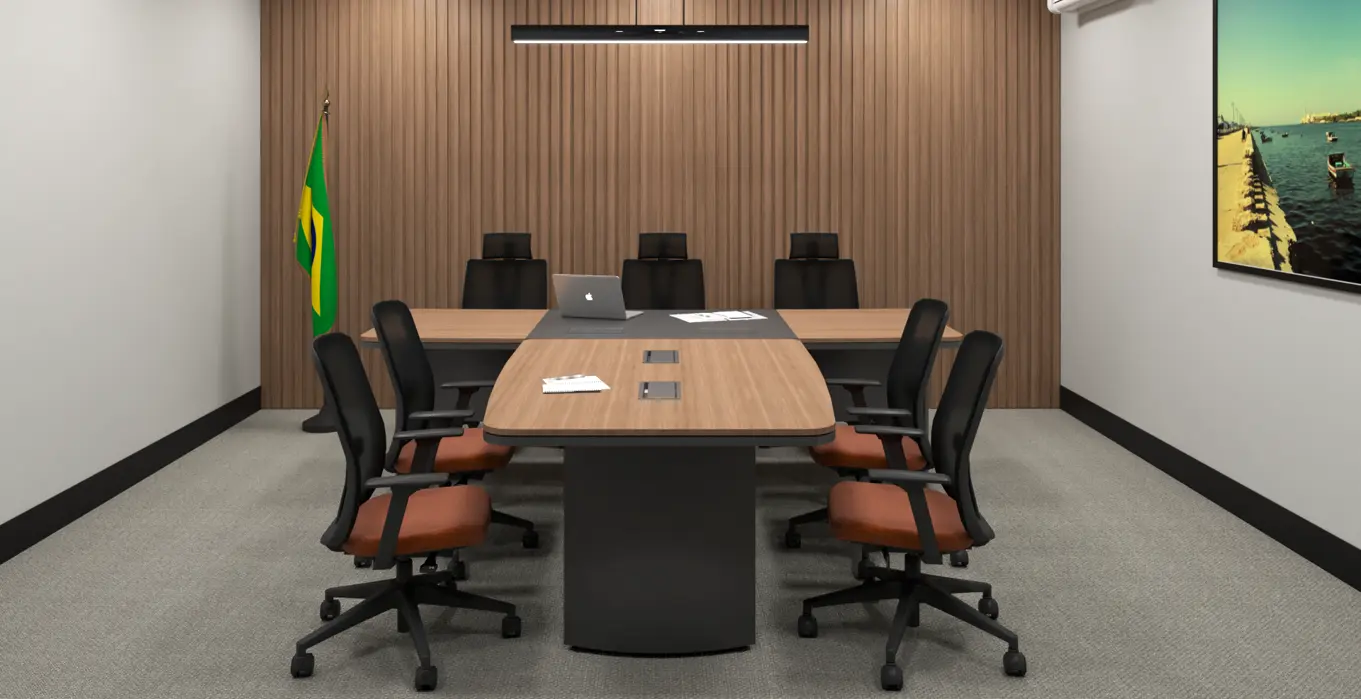 Sala institucional com bandeira do Brasil e mesa de reunião